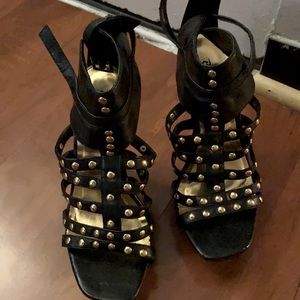 Black platform heels with gold